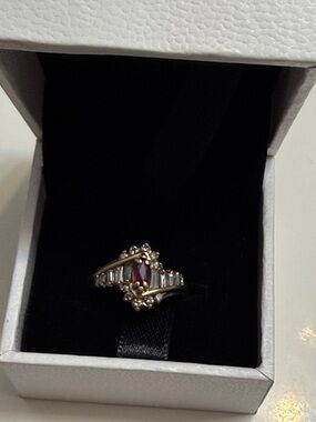 Magic Glo 14KT Gold Ring with Ruby Center Stone and Accent Baguette Diamonds